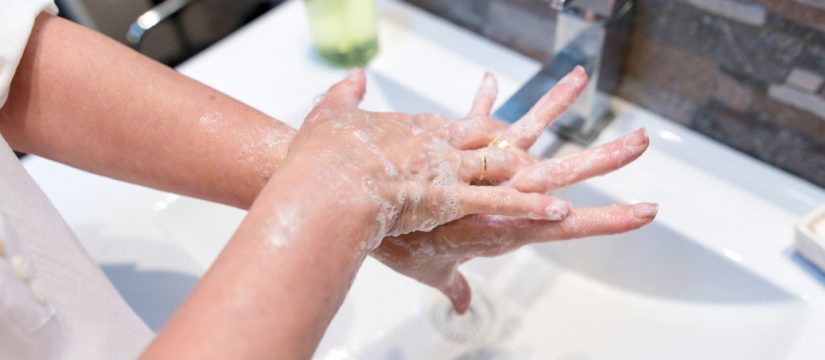 Close up of woman washing her hands with soap 1296x728 header